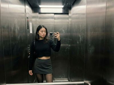 The Unseen Side of Glamour: A Late Night Elevator Moment